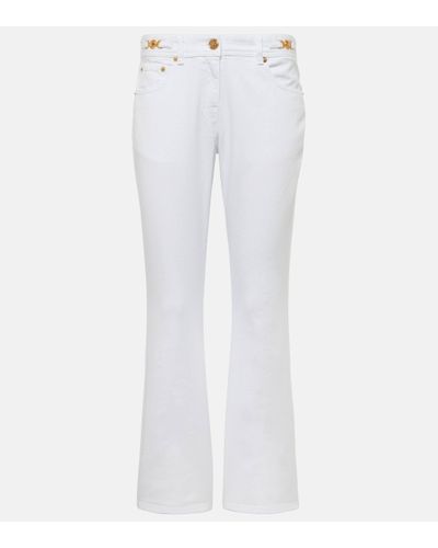 Versace Jean flare a taille basse et ornements - Blanc