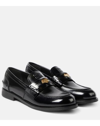 Miu Miu Loafers aus Leder - Schwarz