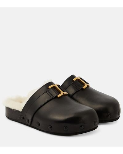 Chloé Slippers Marcie aus Leder und Shearling - Schwarz