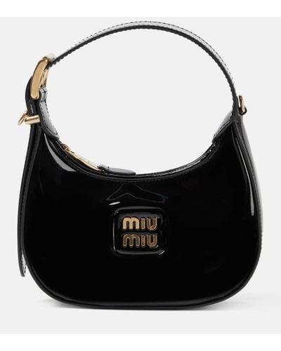 Miu Miu Schultertasche aus Lackleder - Schwarz