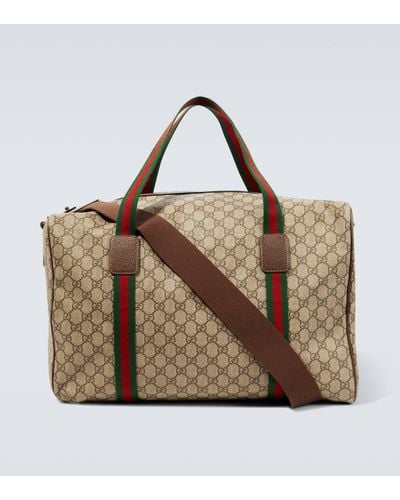 Gucci Sac de voyage Large en toile GG - Marron