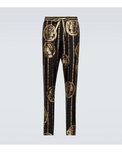 Dolce & Gabbana Pantalon en sarga de seda estampados - Negro