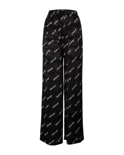 Balenciaga Pantalon ample à taille haute en soie - Noir