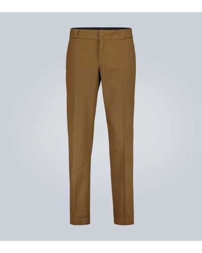 Prada Pantaloni stretch con logo - Neutro