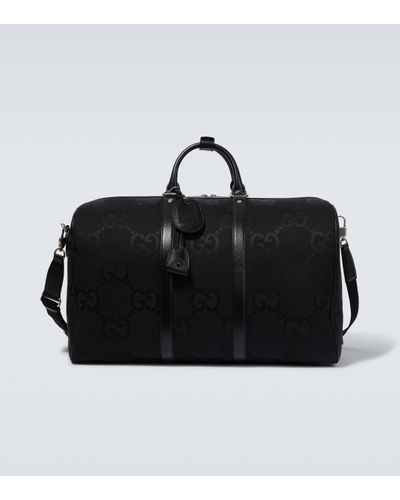 Gucci Jumbo GG Leather-trimmed Travel Bag - Black