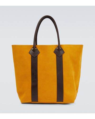 Sacs fourre-tout Jaune pour homme | Lyst