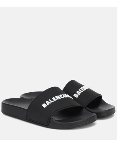 Balenciaga logoembossed Slides  Farfetch