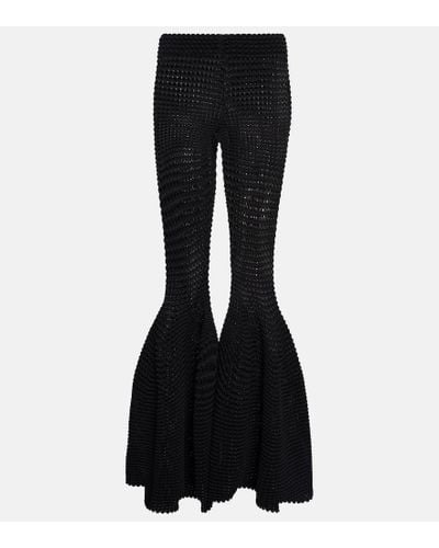 Alaïa Pantalones flared de tiro alto - Negro