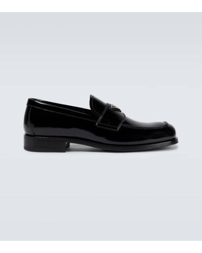 Prada Mocasines con placa del logo - Negro