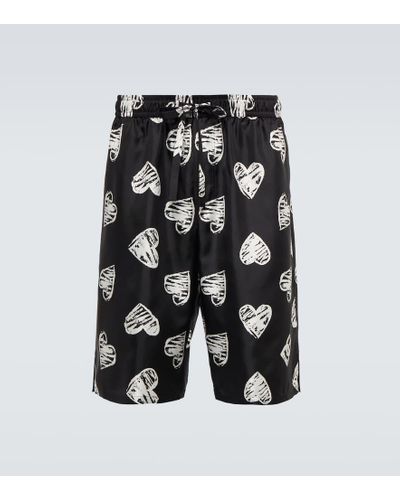 Dolce & Gabbana Shorts in seta con stampa a cuori - Nero