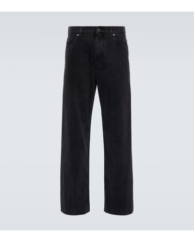 Dolce & Gabbana Jeans anchos con logo - Negro