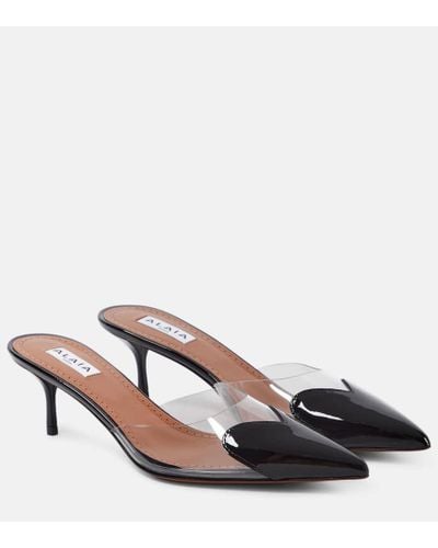 Alaïa Mules Le Coeur de charol y PU - Negro