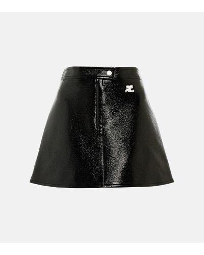 Courreges Minifalda de piel sintetica acampanada - Negro