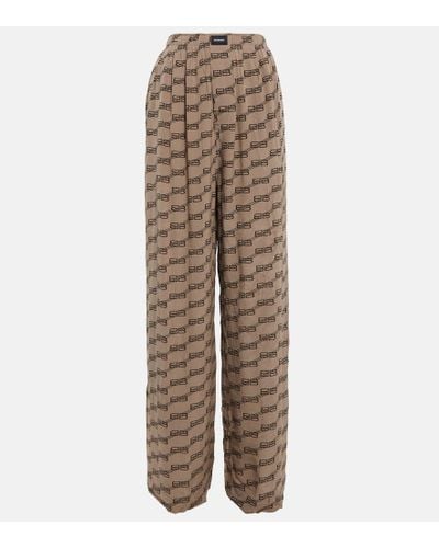 Balenciaga Pantalones anchos en seda de tiro alto - Neutro