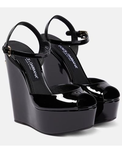 Dolce & Gabbana Wedge-Sandalen aus Lackleder - Schwarz