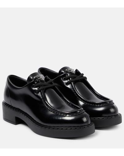 Prada Zapatos con cordones y logo triangular - Negro