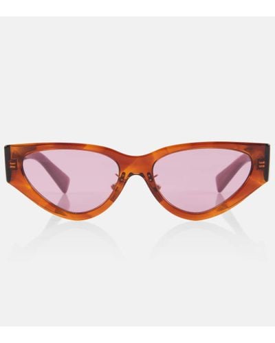 Miu Miu Occhiali da sole cat-eye con logo - Rosso