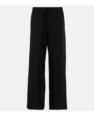 Totême Lyocell And Linen Wide-leg Trousers - Black