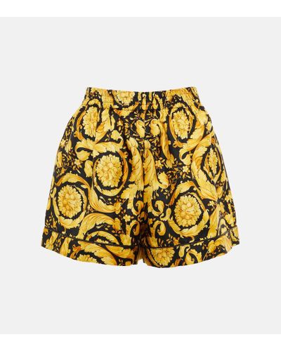 Versace Shorts de seda de tiro alto estampados - Amarillo