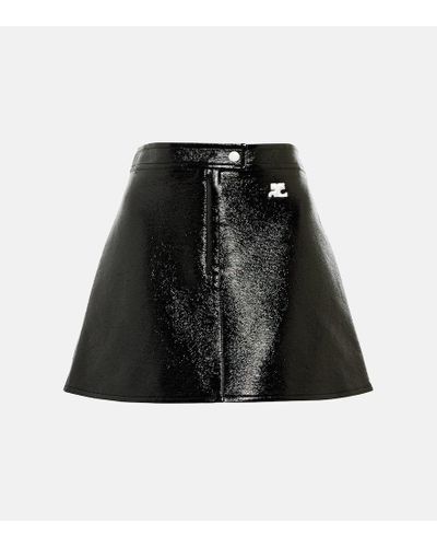 Courreges Minifalda de piel sintetica acampanada - Negro