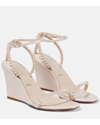 Christian Louboutin Embellished Patent Leather Wedge Sandals - White
