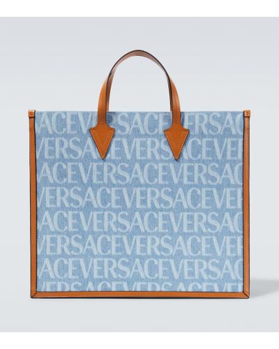 Versace Logo Leather-trimmed Denim Tote Bag - Blue