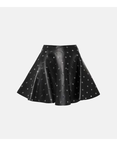 Alaïa Minifalda de piel adornada con ojales - Negro