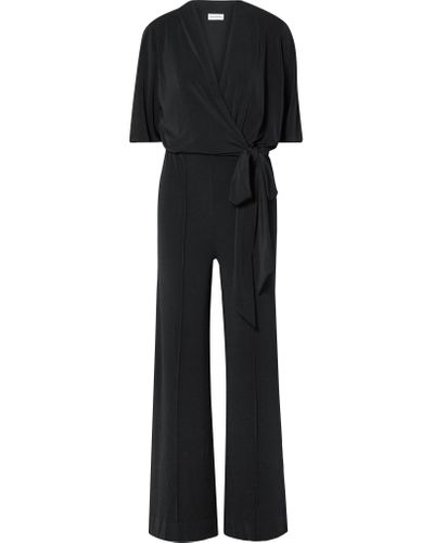 By Malene Birger Synthetic Zhou Belted Wrap-effect Stretch-jersey Jumpsuit  in Black - Lyst