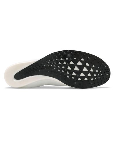 new balance track spikes white