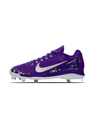 purple and white baseball cleats