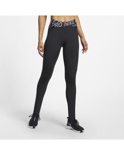 Nike Pro Intertwist Leggings in Black | Lyst UK