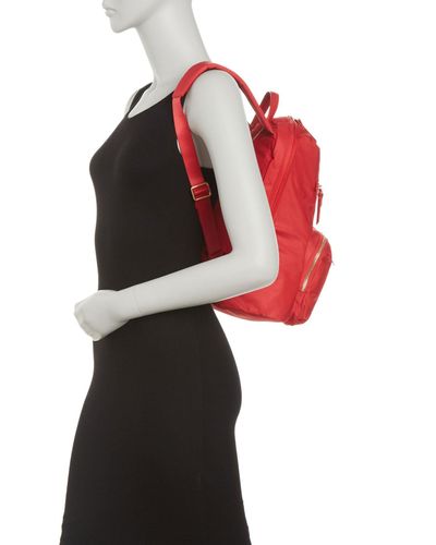 tumi red backpack