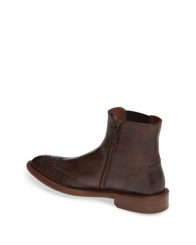 bryson wingtip zip boot