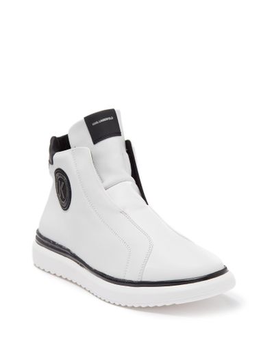white laceless canvas shoes