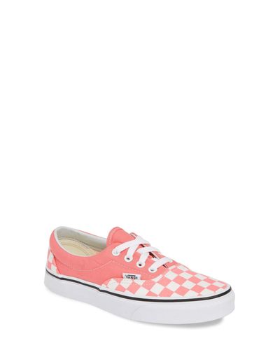 pink and black checkerboard slip on vans