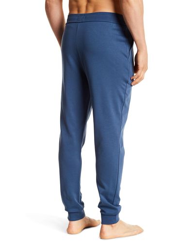 BOSS Cotton Cuffed Sweatpants in Blue for Men - Lyst