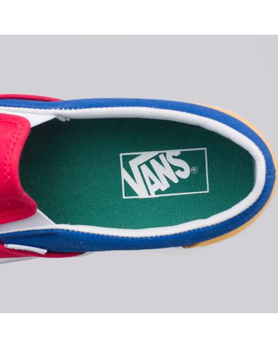 red blue and yellow slip on vans