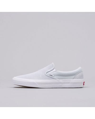 light blue and white slip on vans