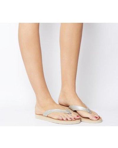 ugg tawney flip flop white Off 50% - www.sbs-turkey.com