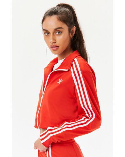 red cropped adidas jacket