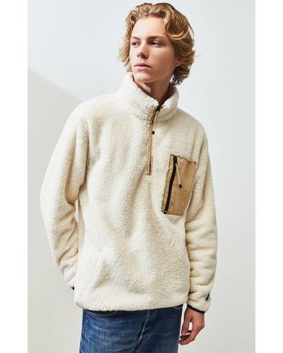white sherpa half zip
