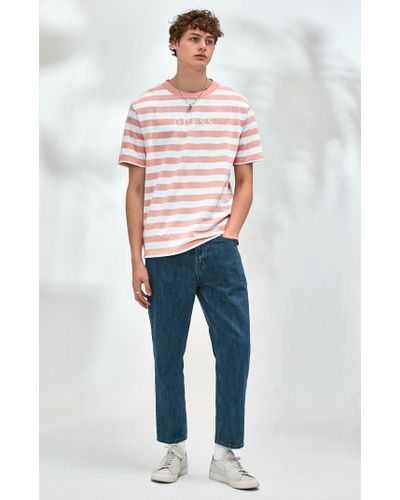 pink and white striped guess shirt