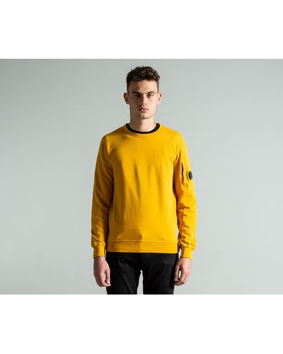 yellow cp company jumper