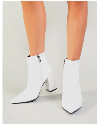 white pointed toe ankle boots