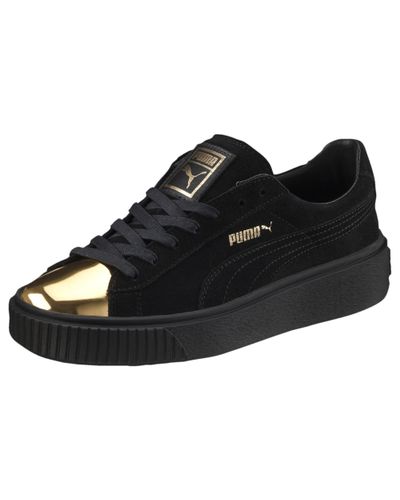 puma black with gold