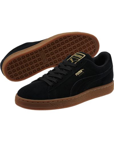 puma black metallic gold