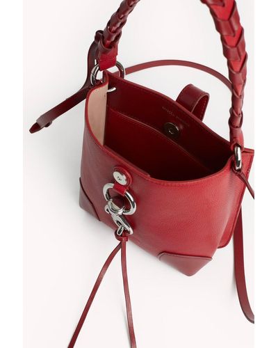 megan mini feed bag with whipstitch