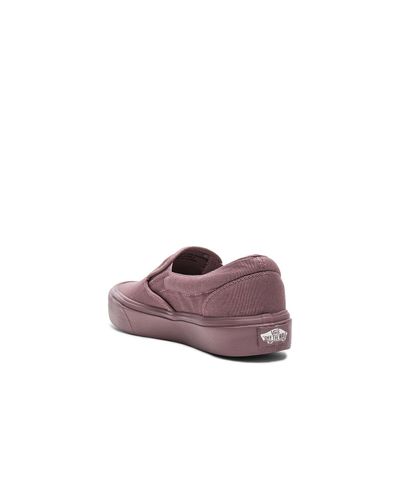 mauve slip on vans