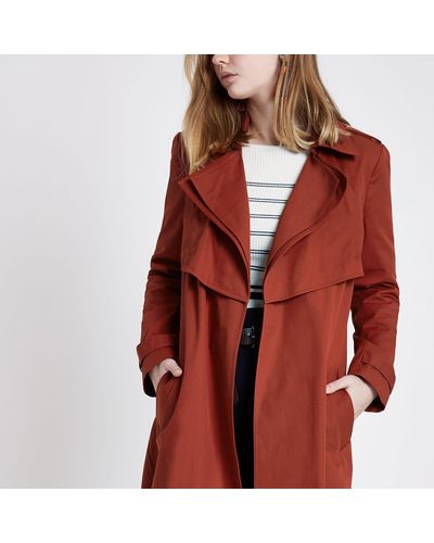rust trench coat