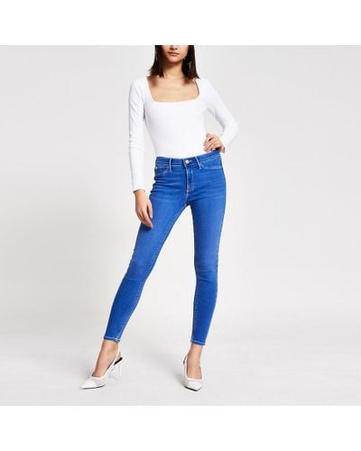 bright blue molly mid rise jeggings